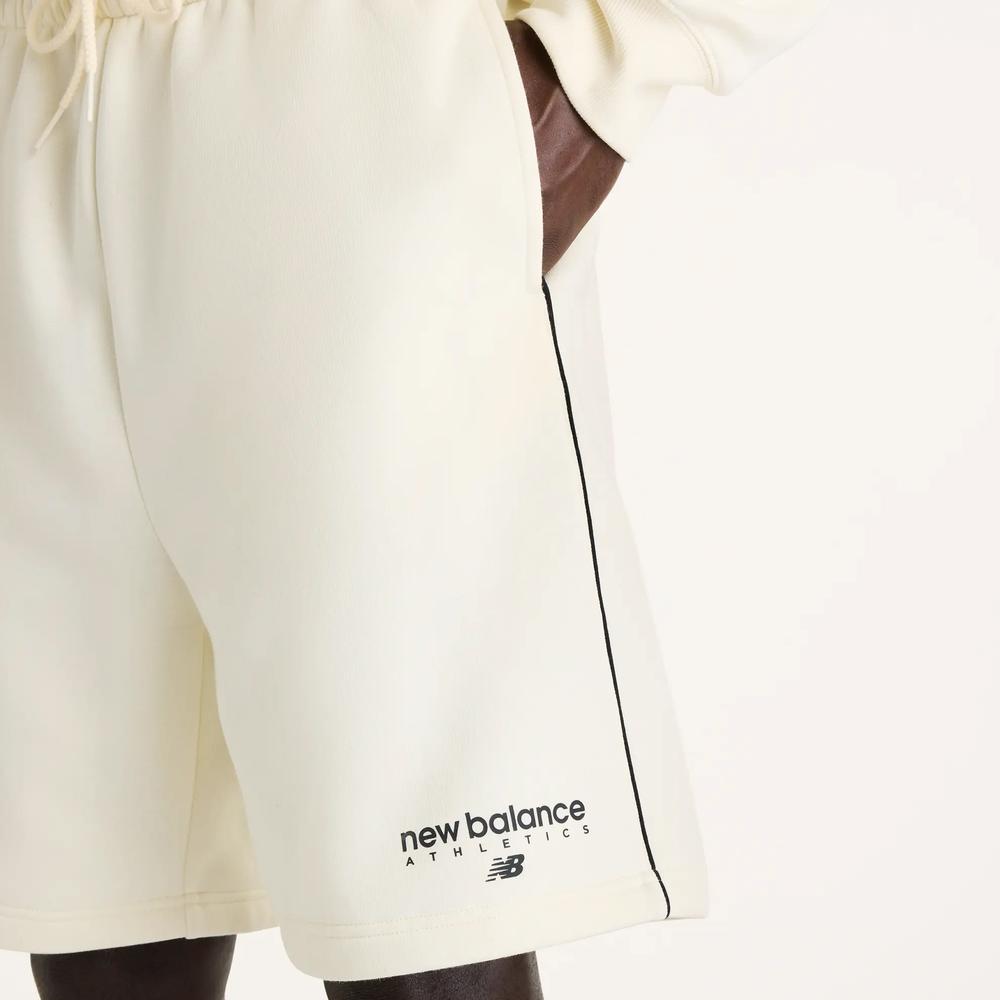 Pánské šortky New Balance Sport Linear Graphic MB62L72AAGA - béžové