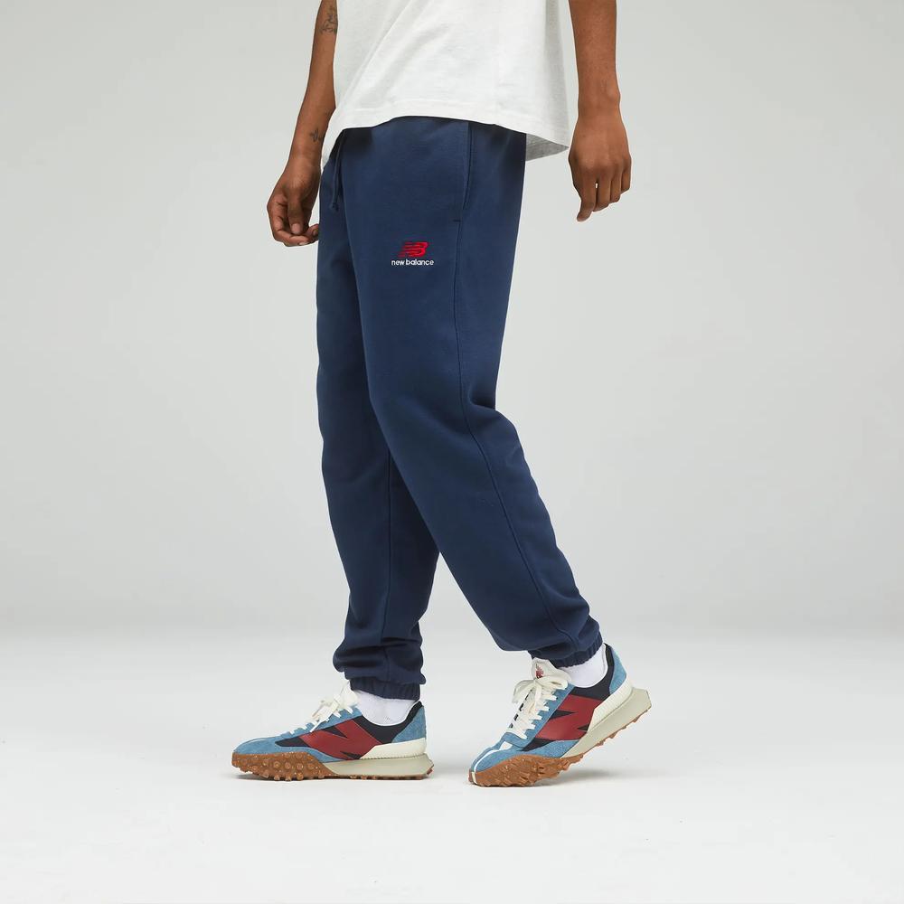 Unisex kalhoty New Balance UP21500NGO – tmavomodrá