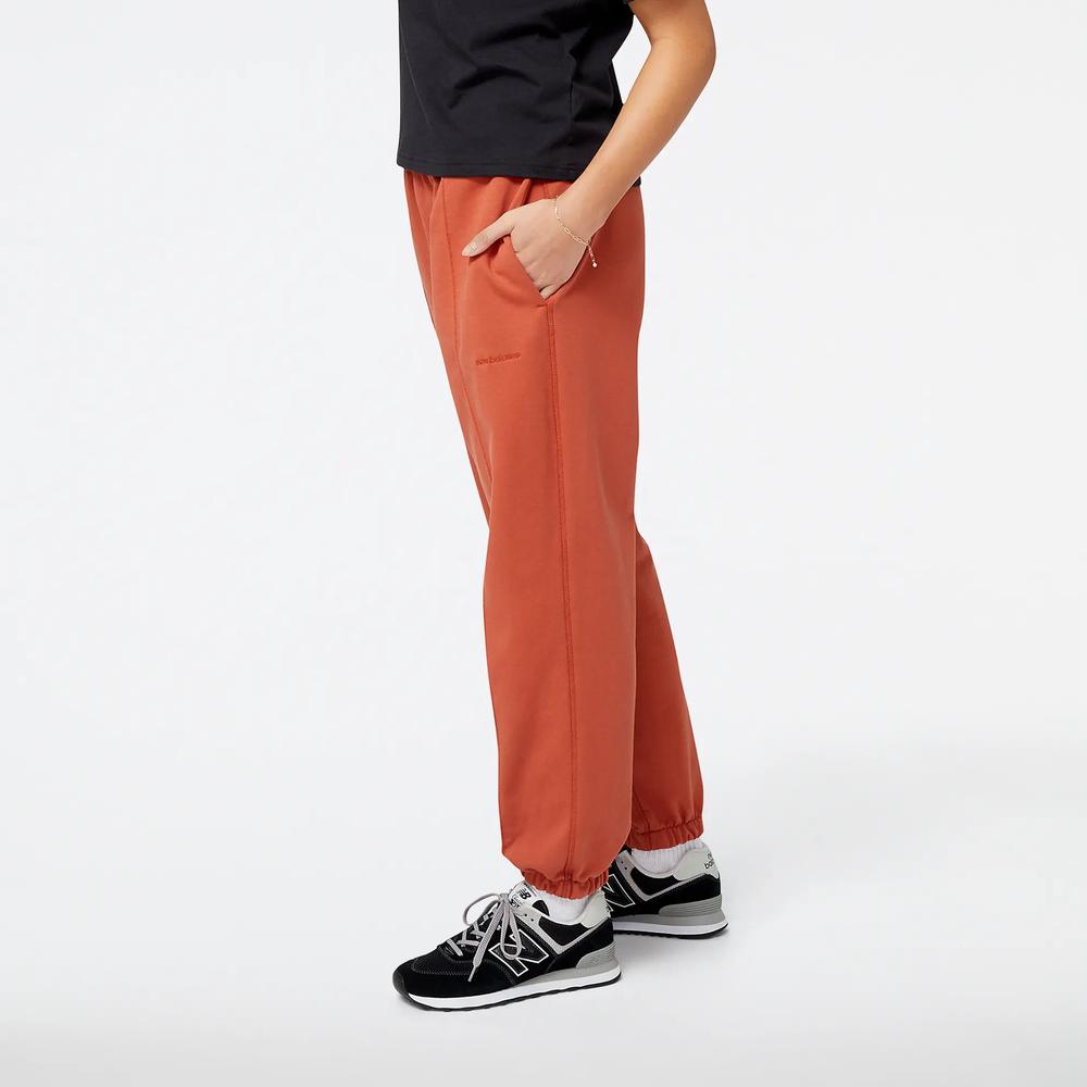 Kalhoty New Balance WP23553MHY - hnědé