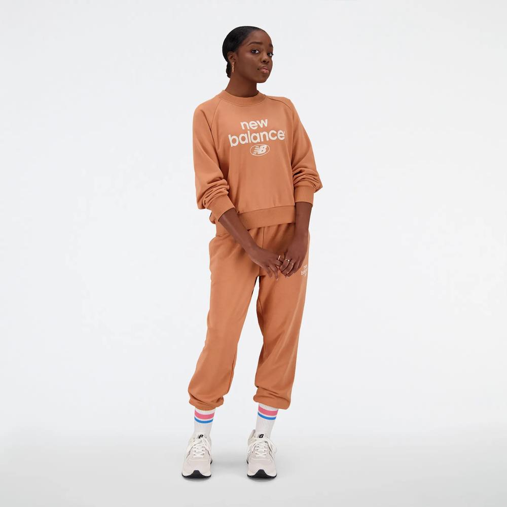 Dámské kalhoty New Balance WP31508SEI – hnědý