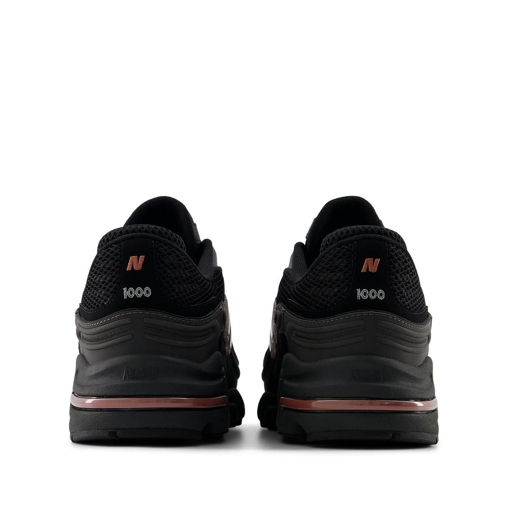 Unisex boty New Balance U100010A - černé