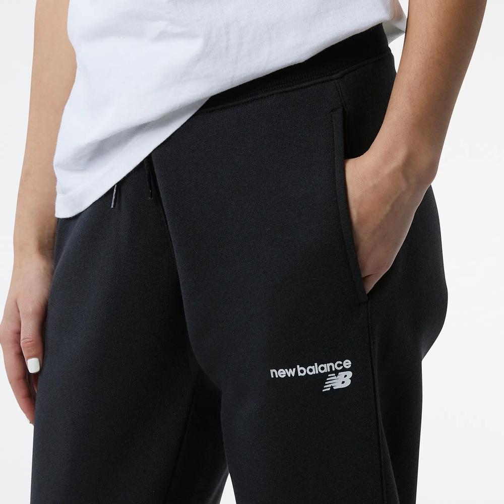Sportovní tepláky New Balance WP03805BK - černé