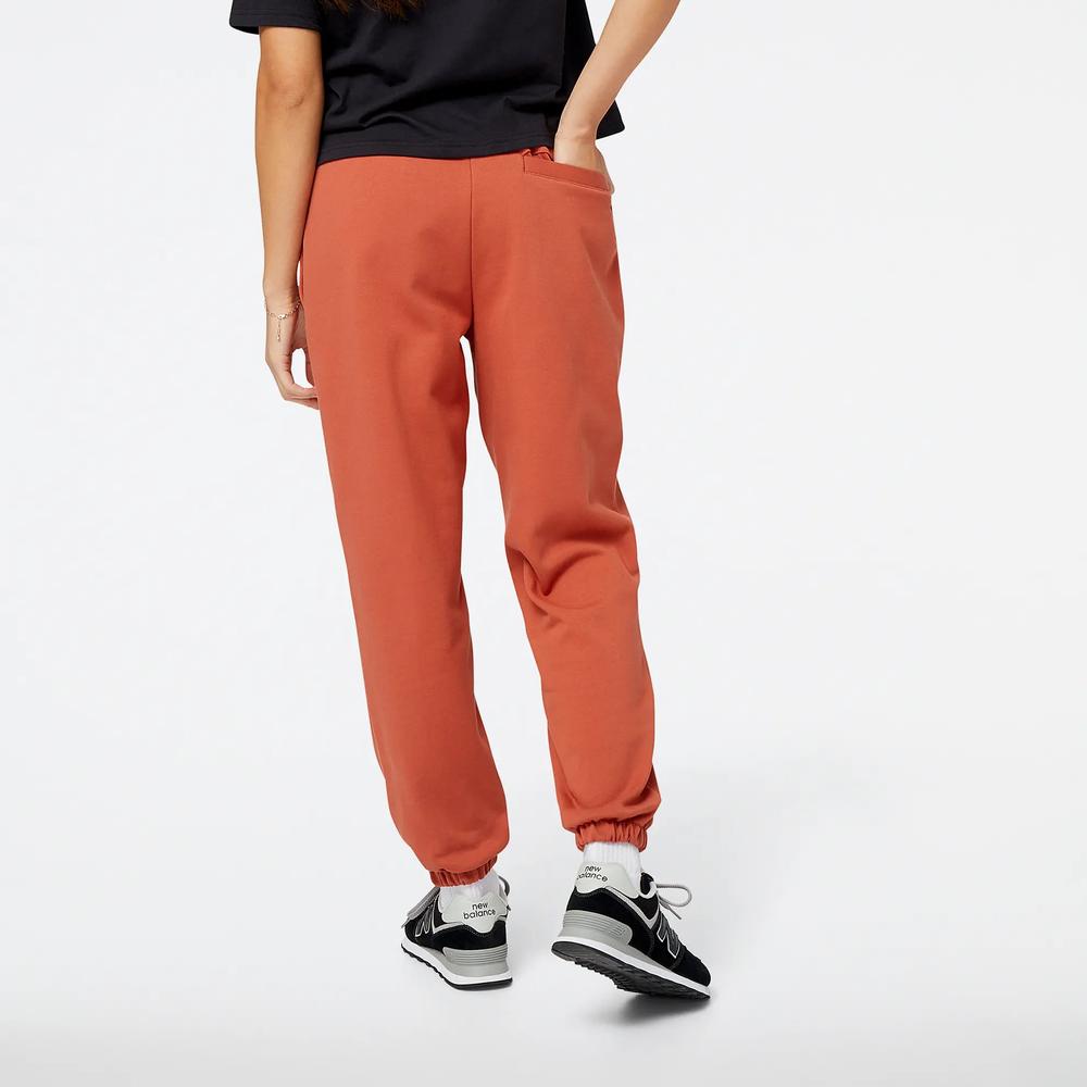 Kalhoty New Balance WP23553MHY - hnědé