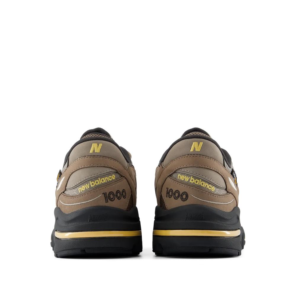 Unisex boty New Balance U100079S - hnědé