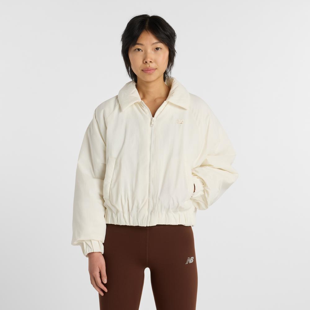 Dámská bunda New Balance WJ61D8YXSST - béžové