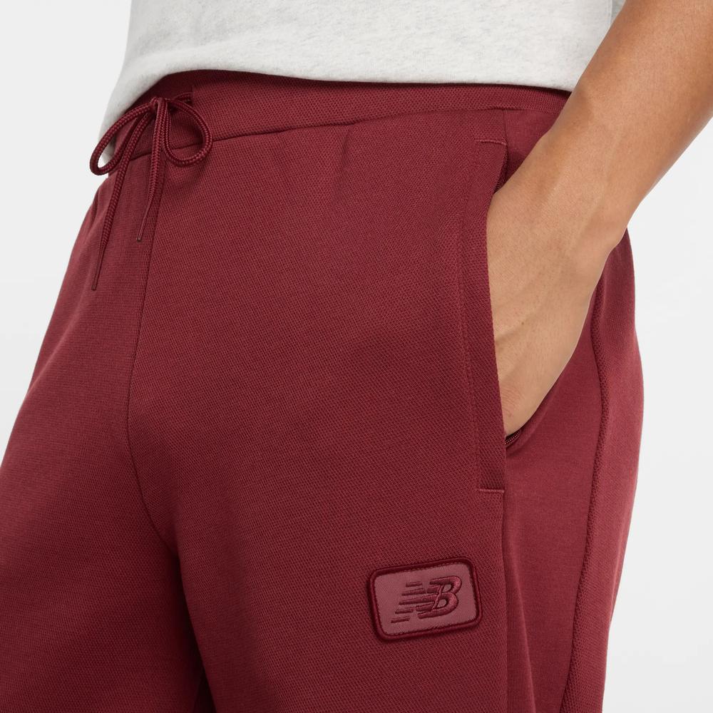 Pánské kalhoty New Balance MP53501MHB - bordové