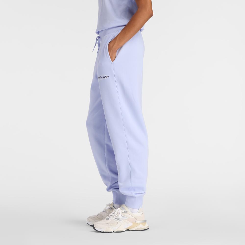 Dámská kalhoty New Balance WB61D3EADYK - fialové