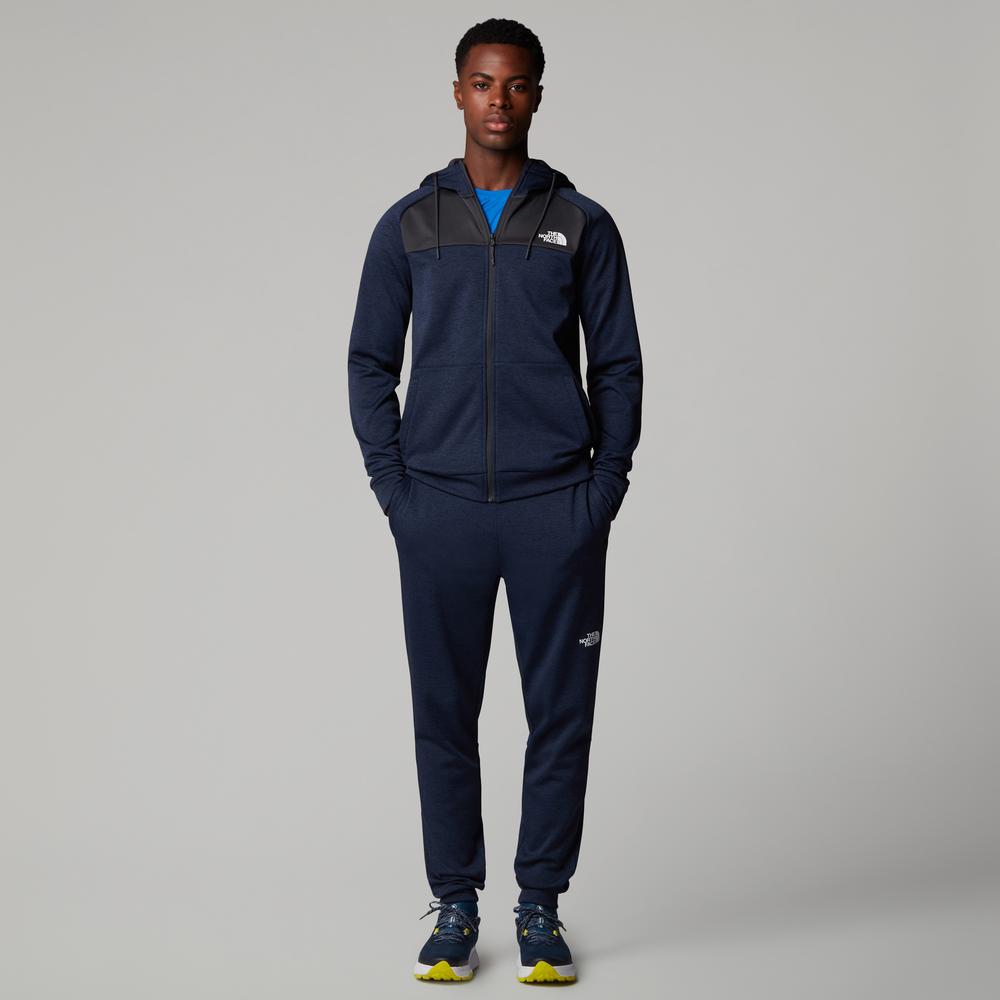 Kalhoty The North Face Joggers Reaxion 0A8CNQ8Q01 - tmavě modrě