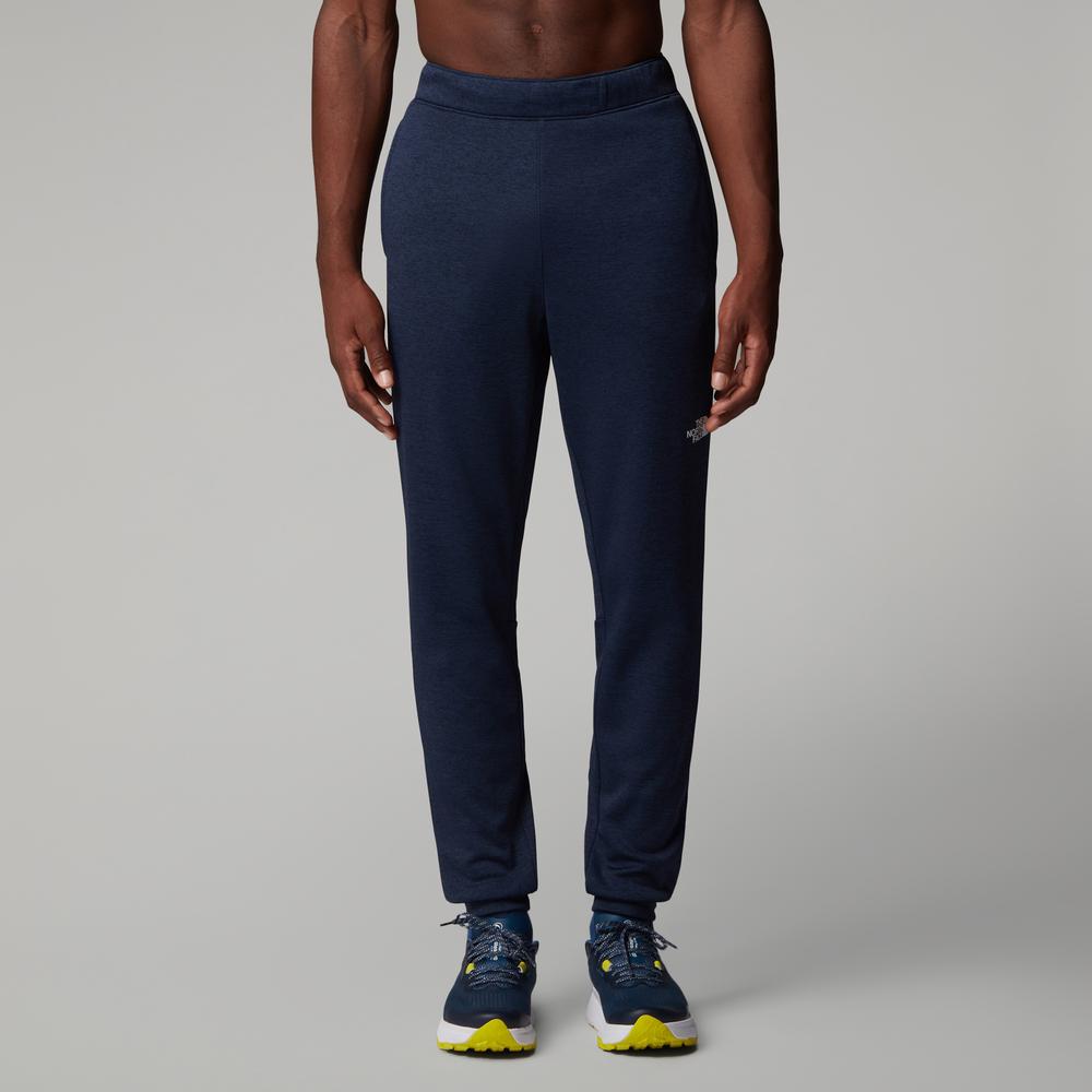 Kalhoty The North Face Joggers Reaxion 0A8CNQ8Q01 - tmavě modrě