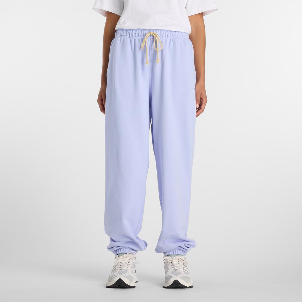 Dámské kalhoty New Balance WP41513DYK - fialové