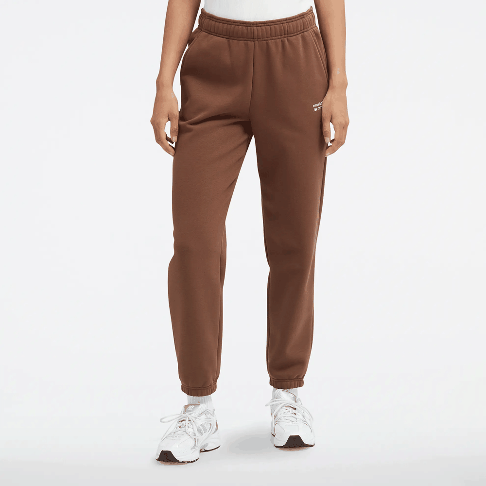 Kalhoty New Balance WP33513PNC - hnědé