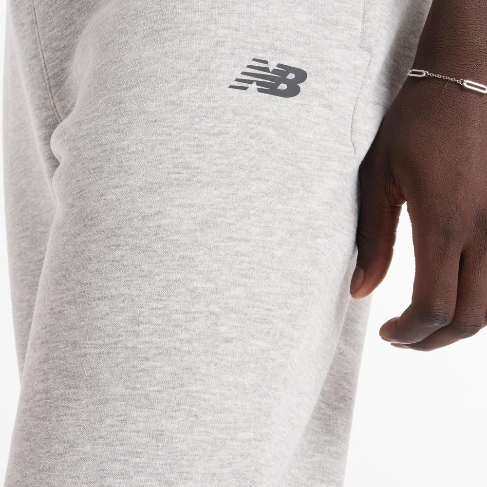 Pánské kalhoty New Balance MP43904AG - šedivé