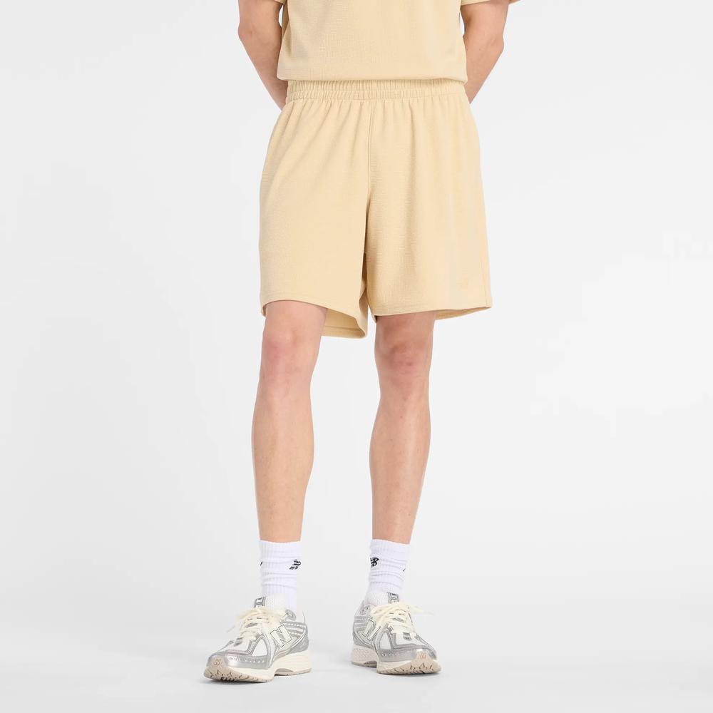 Pánské šortky New Balance MB61V17CABC - žluté