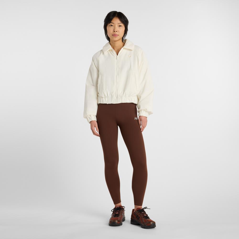 Dámská bunda New Balance WJ61D8YXSST - béžové