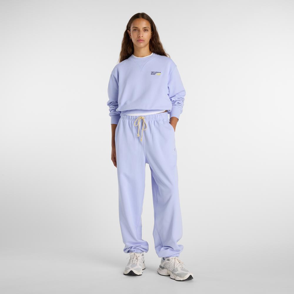 Dámské kalhoty New Balance WP41513DYK - fialové