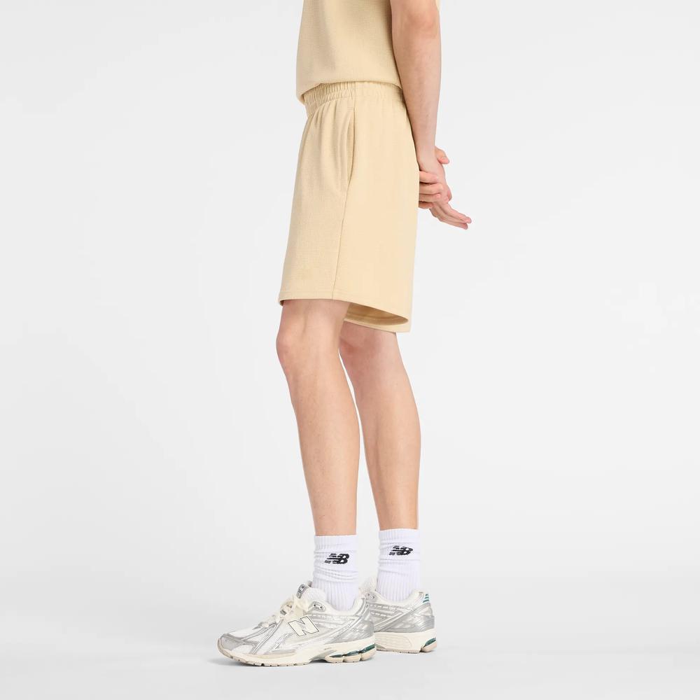 Pánské šortky New Balance MB61V17CABC - žluté