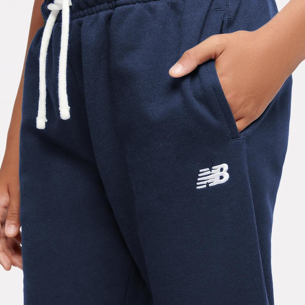Dětské kalhoty New Balance LAKB0060NNY - tmavě modrě