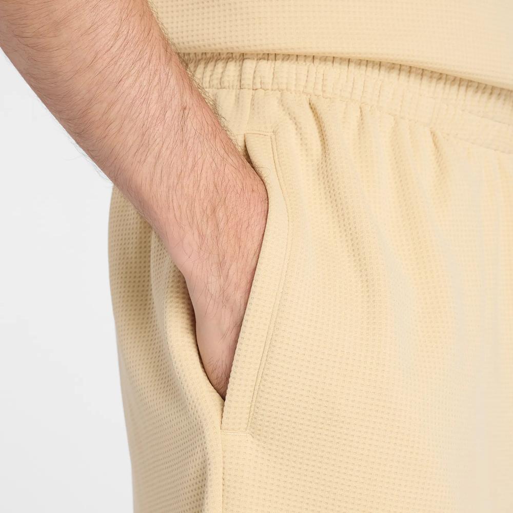 Pánské šortky New Balance MB61V17CABC - žluté