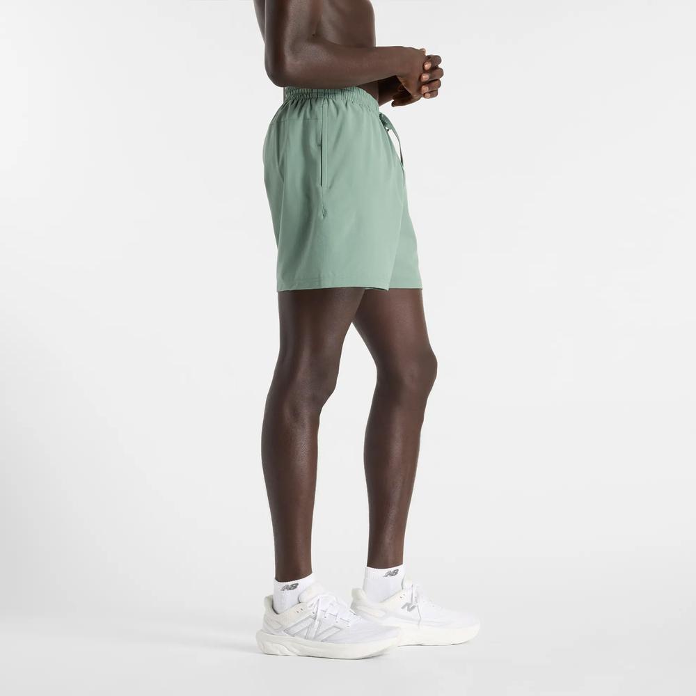 Pánské šortky New Balance MS41227DKJ - zelené