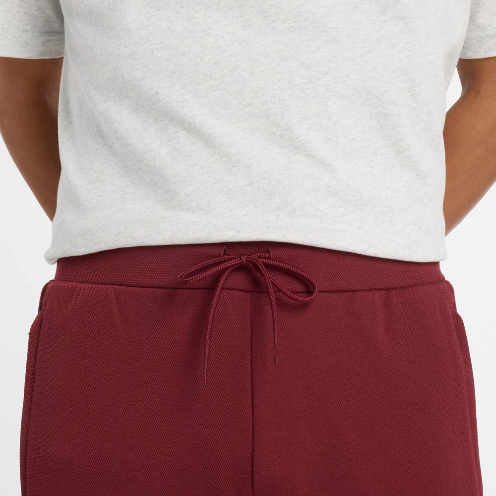 Pánské kalhoty New Balance MP53501MHB - bordové