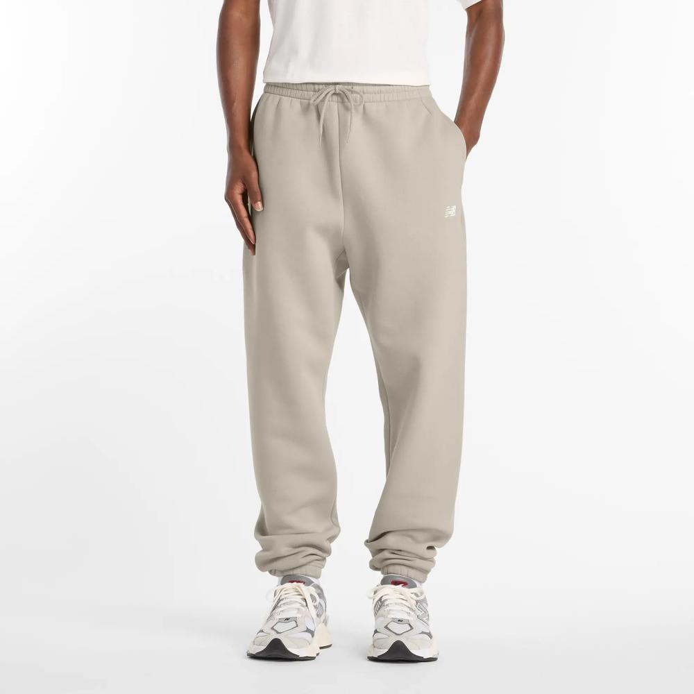 Pánské kalhoty New Balance MP41503TWF - béžové