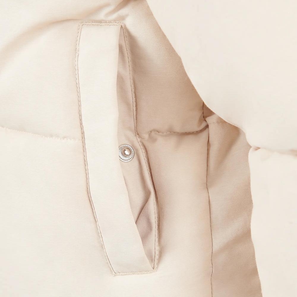 Dětské bunda New Balance LAKG0230BIS - béžové