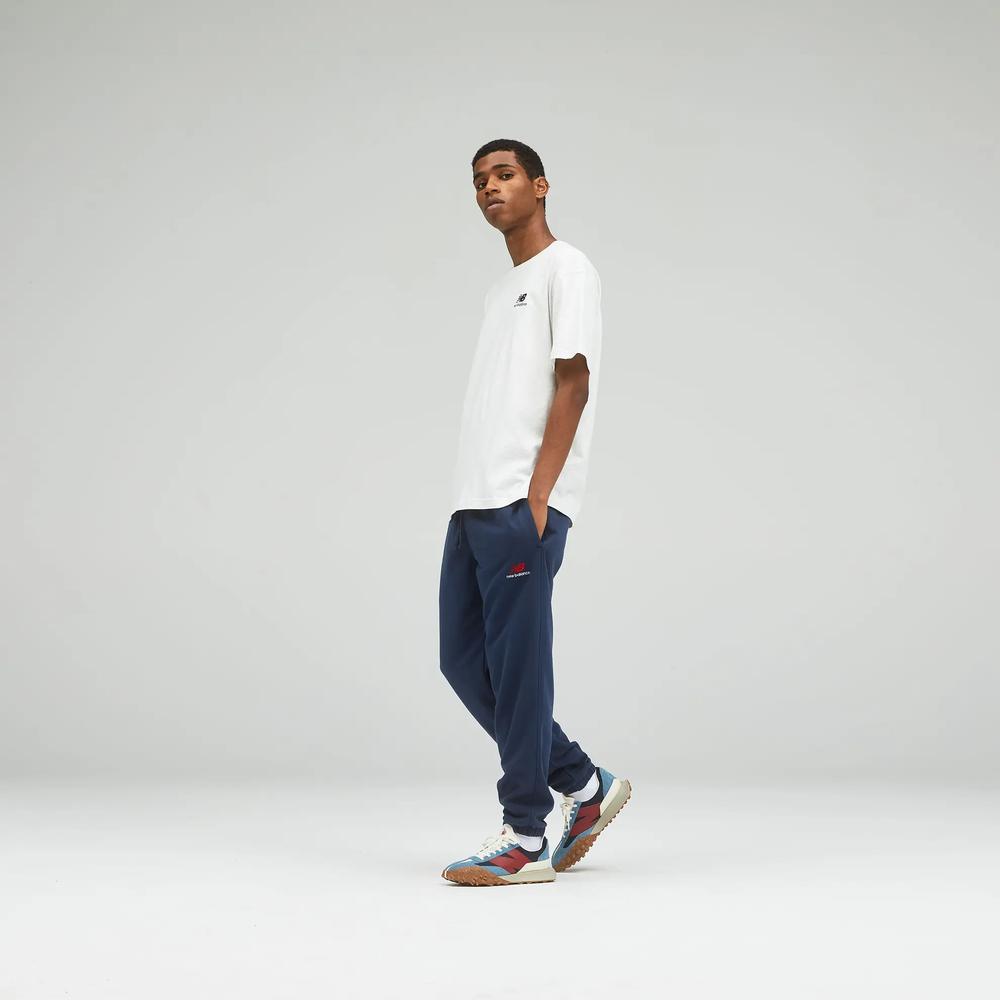 Unisex kalhoty New Balance UP21500NGO – tmavomodrá