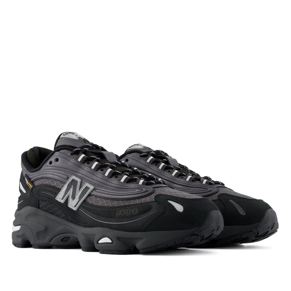 Unisex boty New Balance U100095J - černé