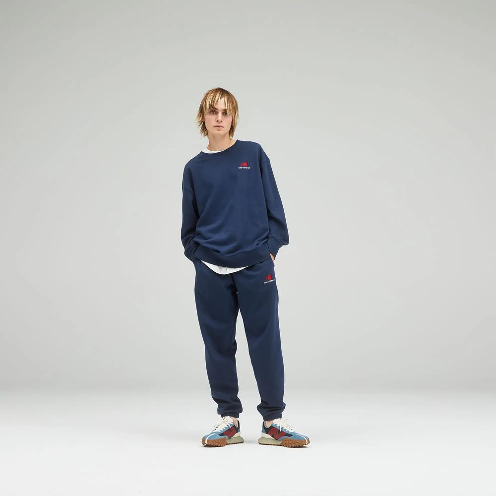 Unisex kalhoty New Balance UP21500NGO – tmavomodrá