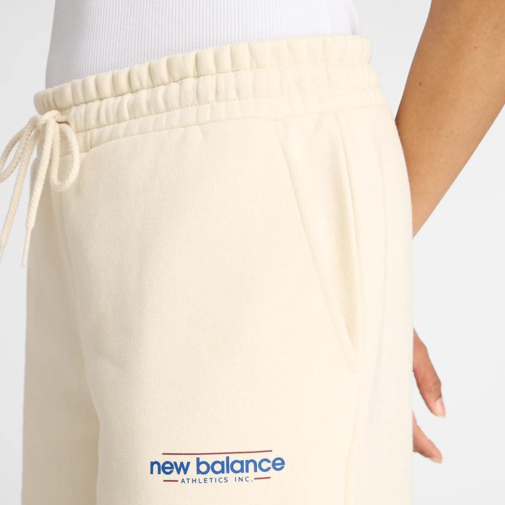 Dámská kalhoty New Balance WP53903LIN - béžové