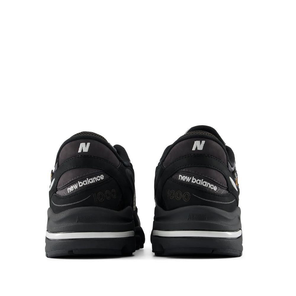 Unisex boty New Balance U100095J - černé