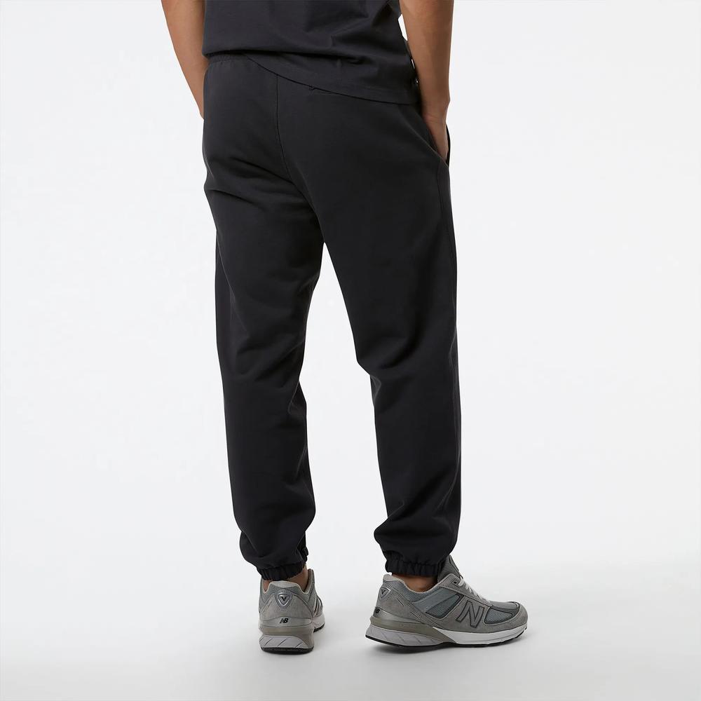 Sportovní tepláky New Balance MP23551PHM - černé