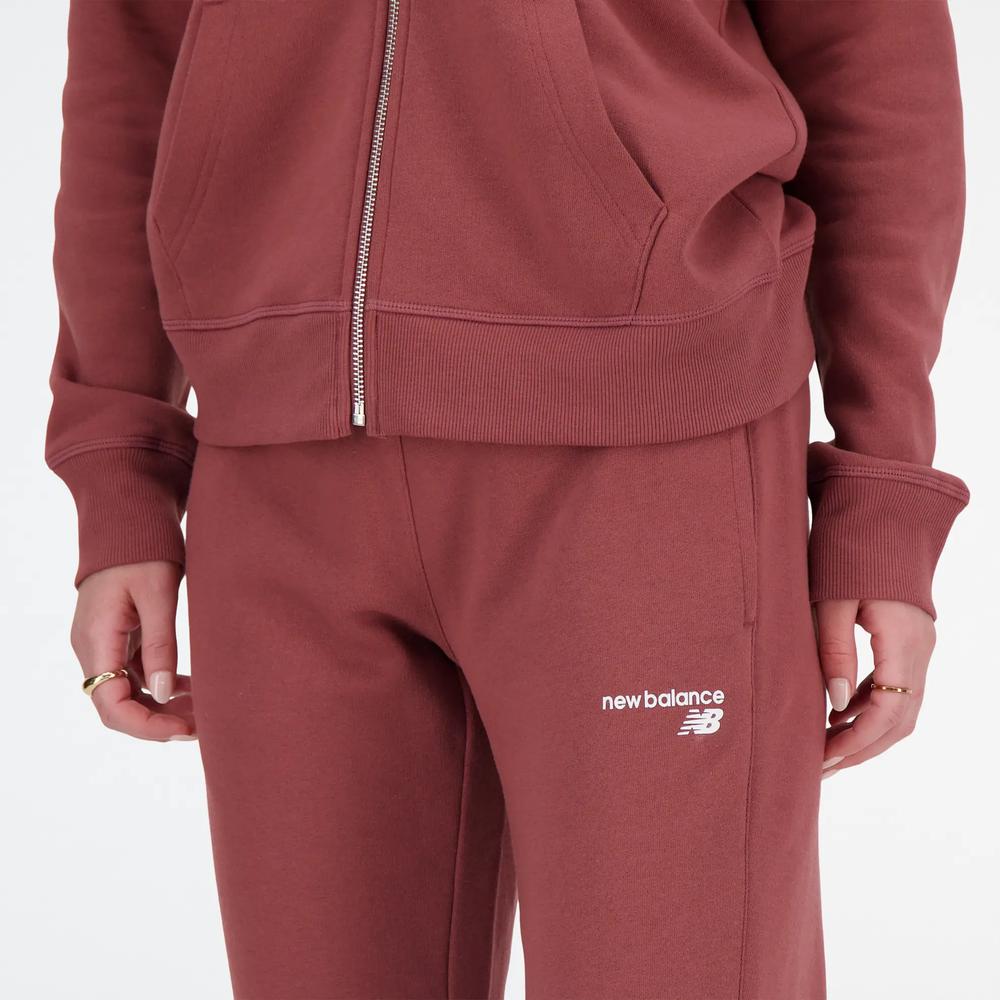 Sportovní tepláky New Balance WP03805WAD - růžové