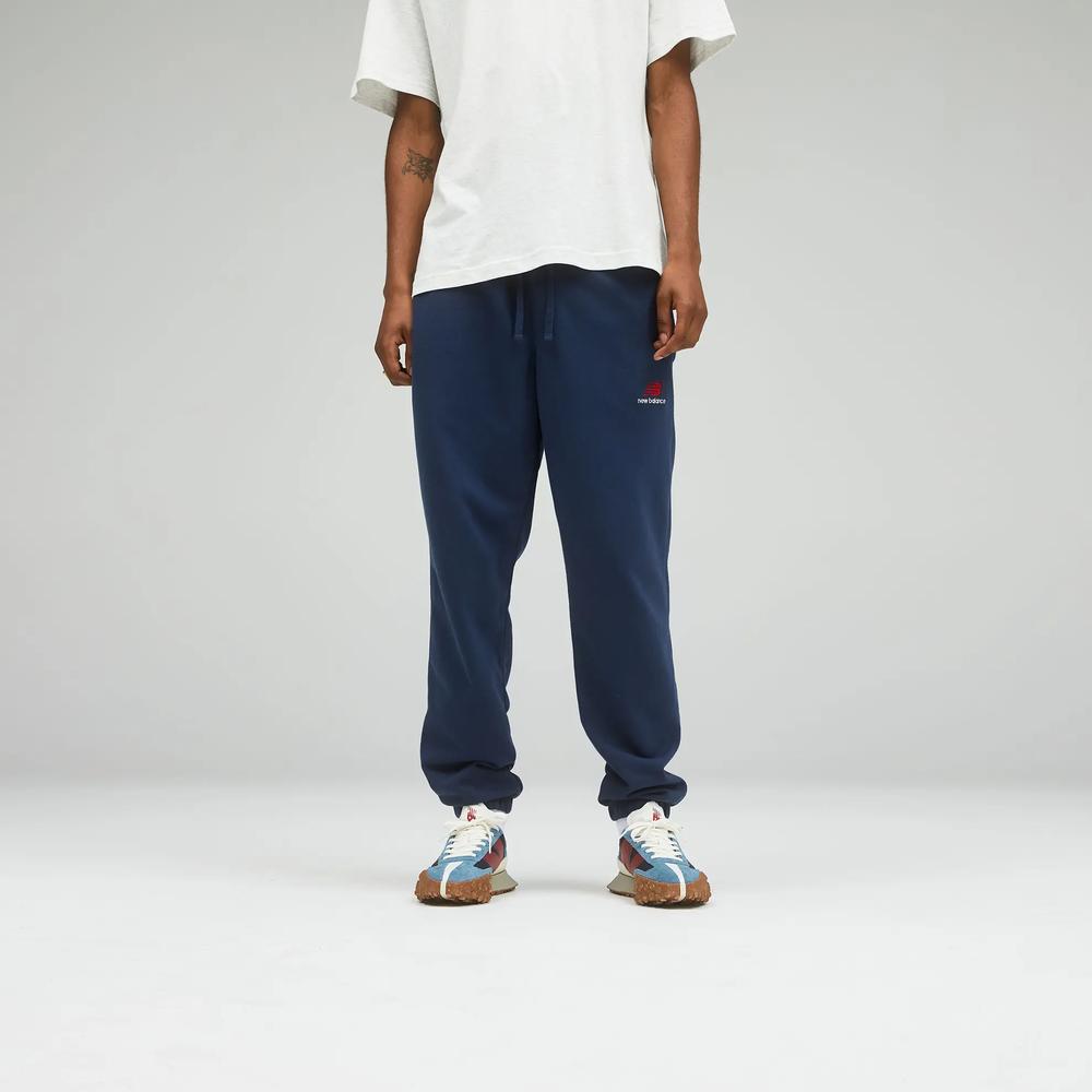 Unisex kalhoty New Balance UP21500NGO – tmavomodrá