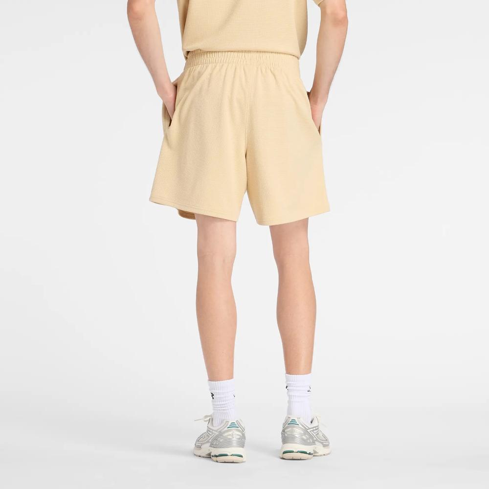 Pánské šortky New Balance MB61V17CABC - žluté