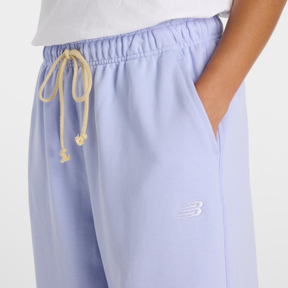 Dámské kalhoty New Balance WP41513DYK - fialové