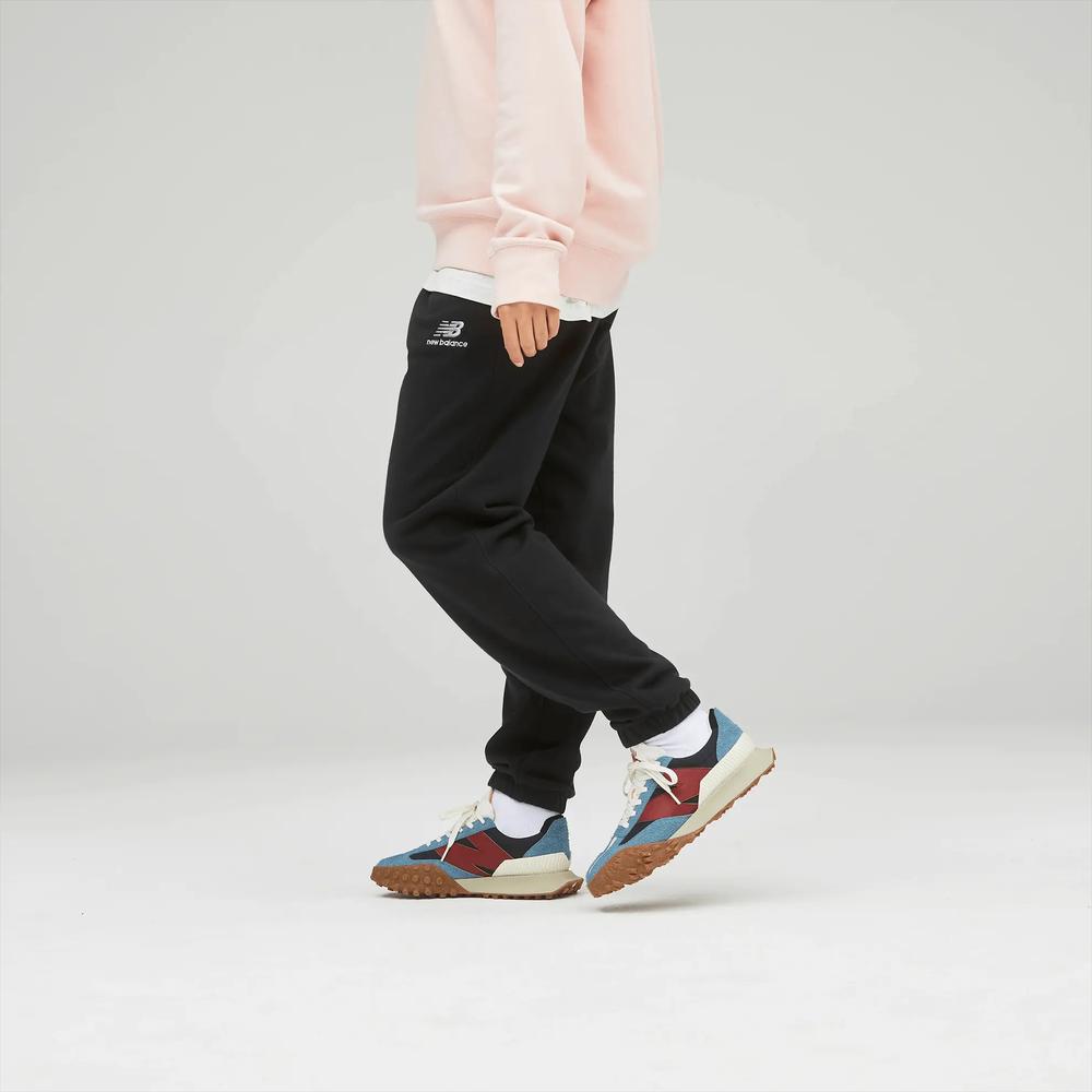 Sportovní tepláky New Balance UP21500BK - černé