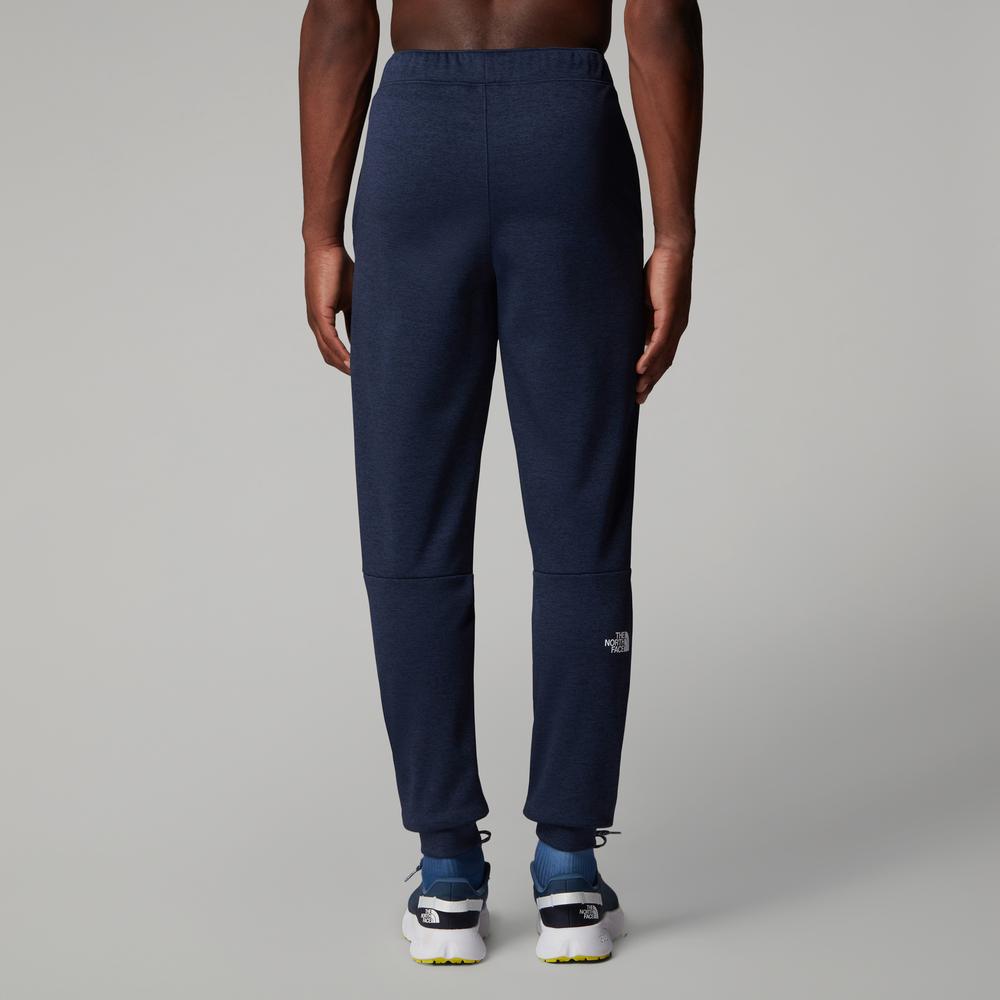 Kalhoty The North Face Joggers Reaxion 0A8CNQ8Q01 - tmavě modrě