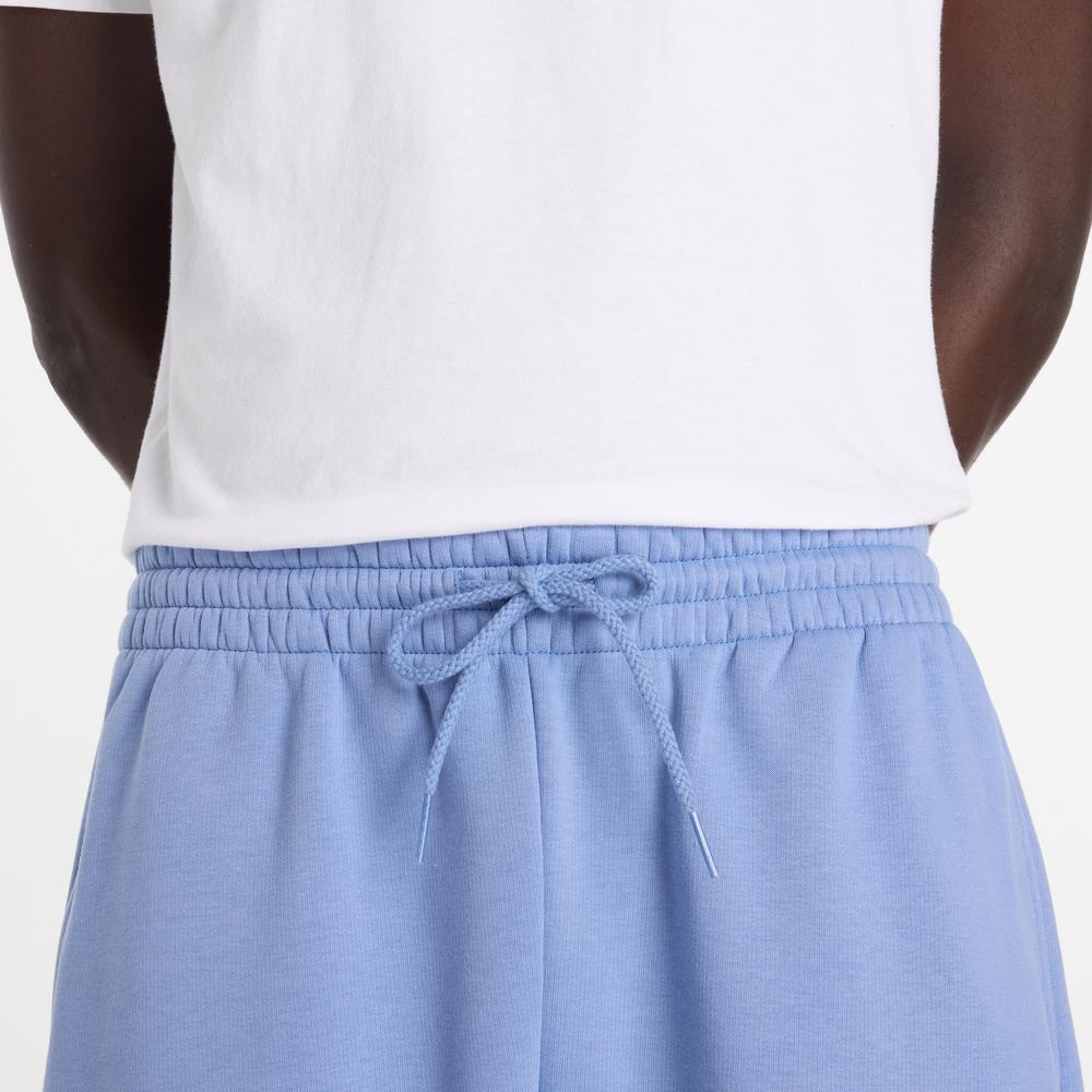 Pánské kalhoty New Balance Reimagined Fleece Jogger MB61E74AAA3 - modré