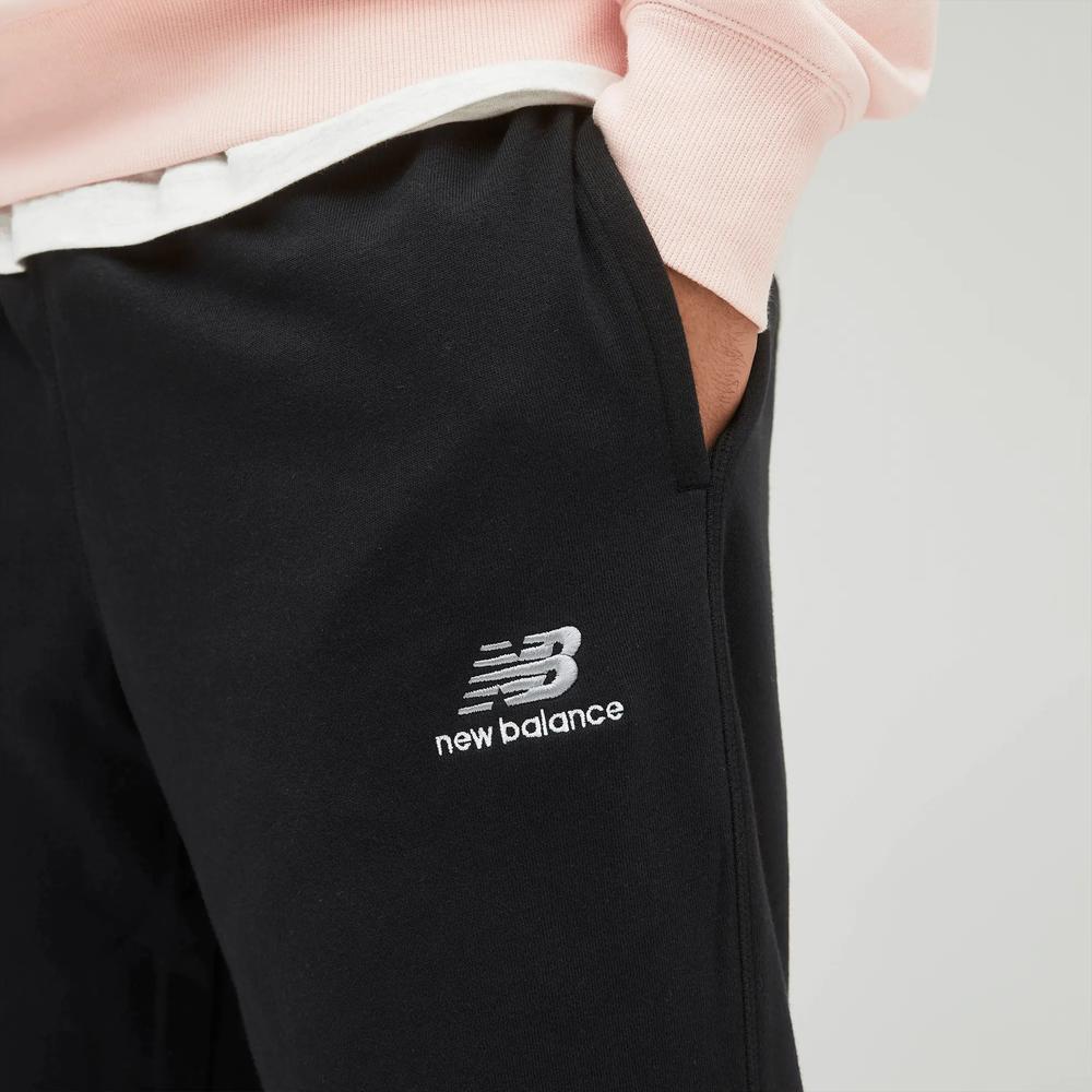 Sportovní tepláky New Balance UP21500BK - černé