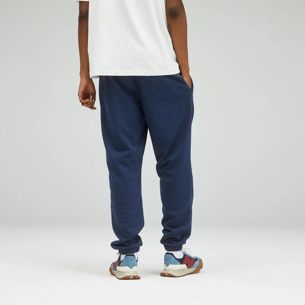 Unisex kalhoty New Balance UP21500NGO – tmavomodrá