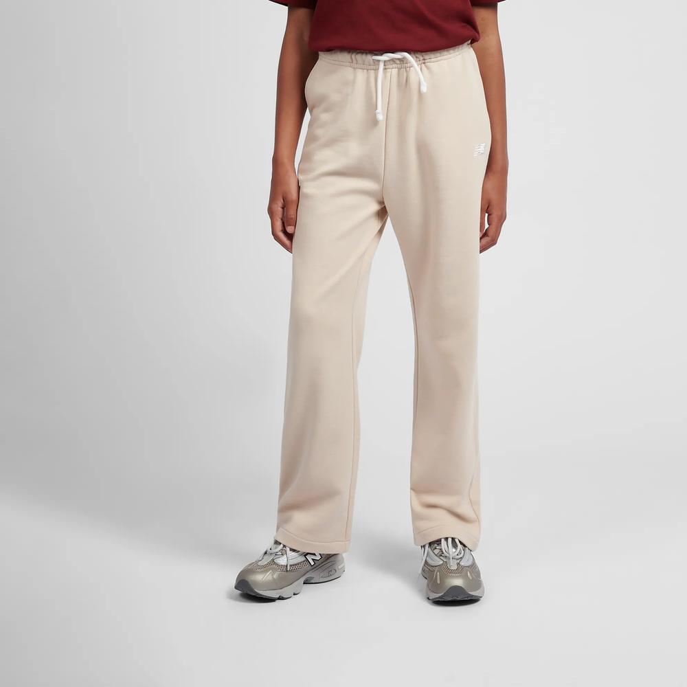 Dětské kalhoty New Balance LAKG0216BIS  - béžové