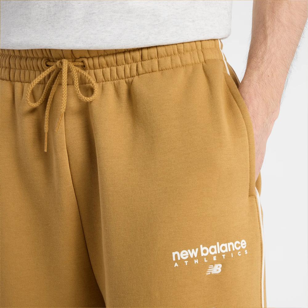 Pánské kalhoty New Balance MB61M77EABG - oranžové